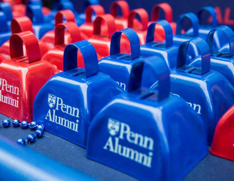 Rows of red and blue Penn Alumni bells